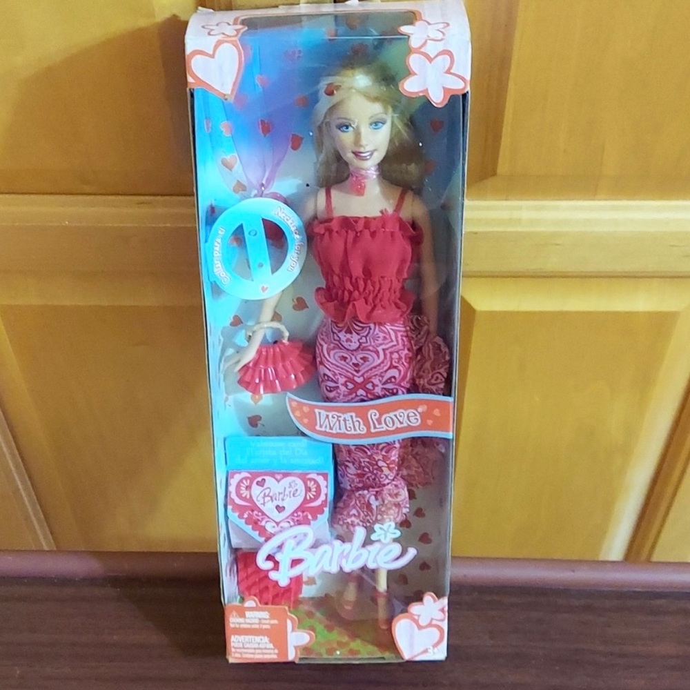Mattel  barbie with love dated 2005 new box open on top.